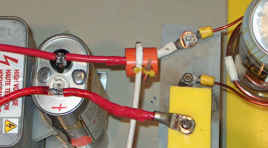 Rogowski coil in place in a small can crusher to perform measurement of high current pulses