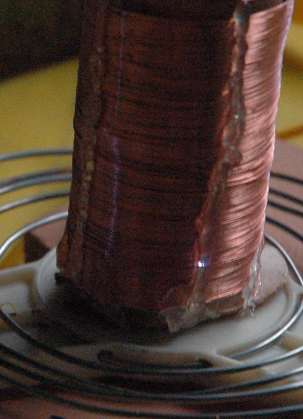 The secondary former is wound with fine wire from the microwave oven fan motor winding.