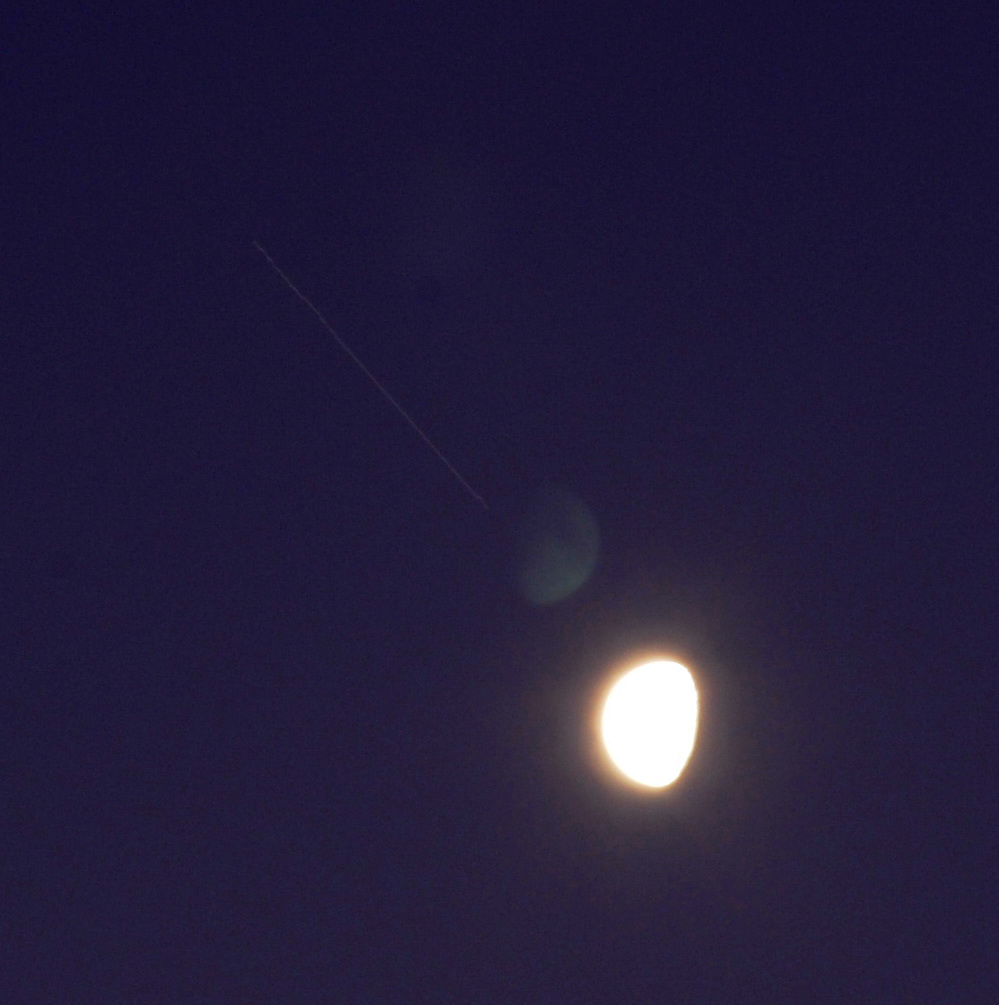 ISS transit seen near the moon