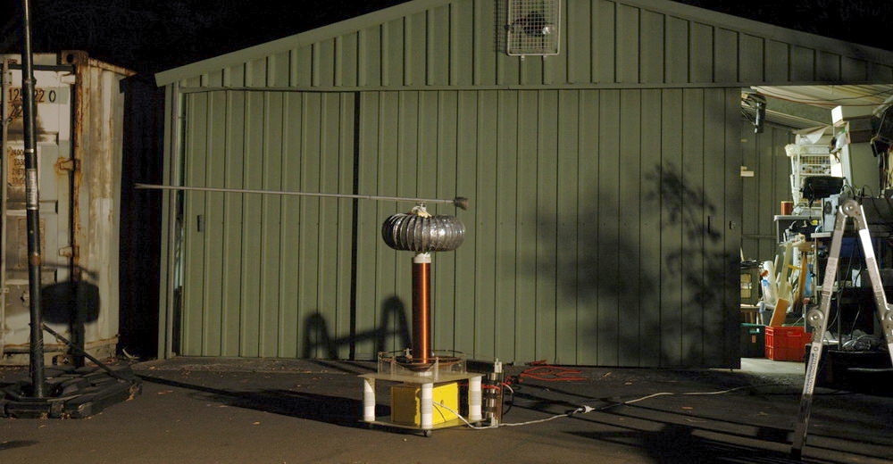  The first setup of a rotating rod on top of a Tesla coil using an aluminium tube and a small reduction motor.