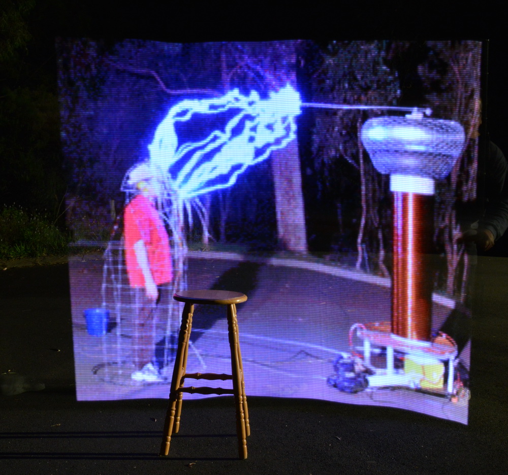 Pixelstick Tesla coil image in the backyard